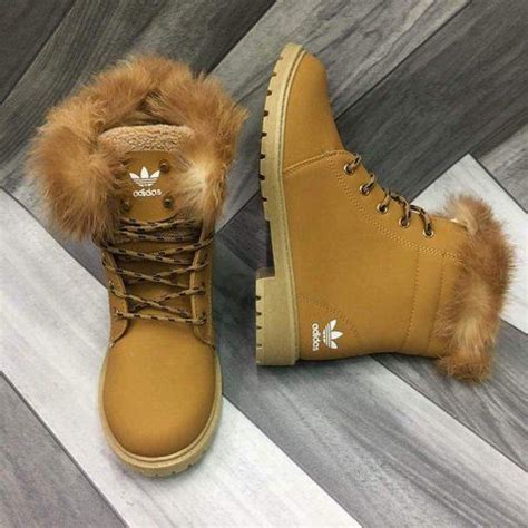 female fur adidas boots.